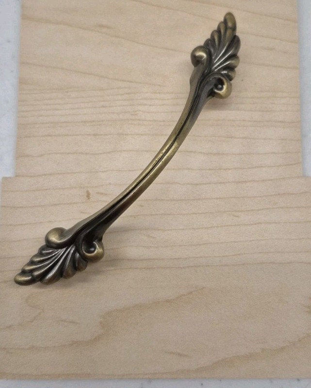 LIBERTY 4-1/2″ Antique Brass Traditional Bow Cabinet Pull P73000H-AB-C