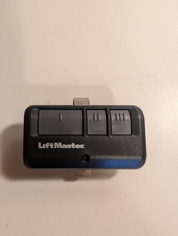 Used💥 LiftMaster 893Max Remote Control – Black-with sunvisor clip.