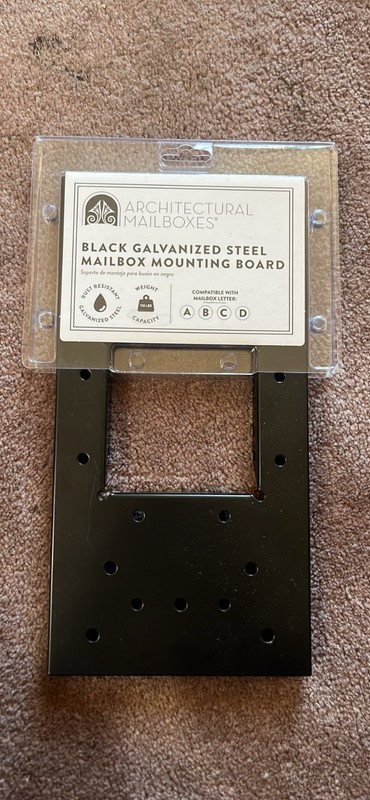Mailbox mounting board, unopened. Galvanized steel